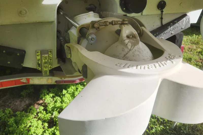 Slide: The Image of Close-up of a 2013 Panga Center Console boat propeller and stern. - 22