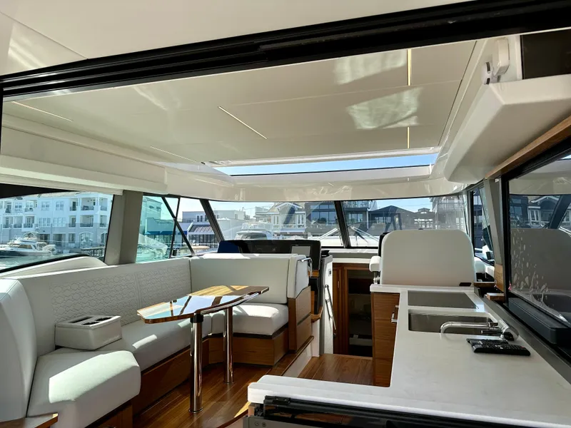Slide: The Image of Luxurious interior of 2024 Tiara Yachts 48 LE, featuring modern seating and sleek design. - 42
