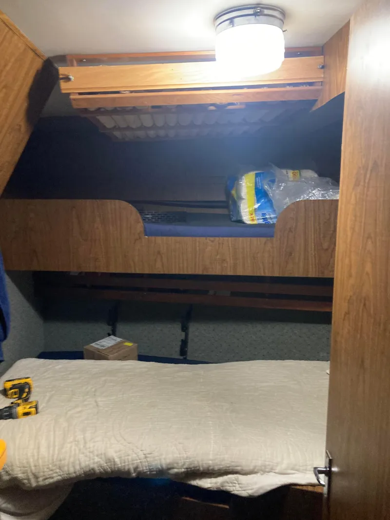 Slide: The Image of 1979 Custom Longline/Tender/Crabber boat cabin interior with bunk bed and storage. - 3