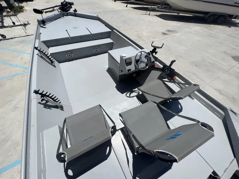 Slide: The Image of 2021 Southfork 20X72 boat interior with seating and steering console. - 14