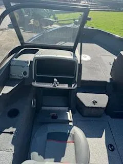 Slide: The Image of 2024 Tracker Pro Guide V-175 WT boat interior with seating and console. - 13