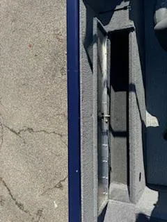 Slide: The Image of 2024 Tracker Pro Guide V-175 WT boat interior detail with storage compartment. - 14