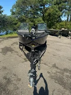 Slide: The Image of 2024 Tracker Pro Guide V-175 WT boat on trailer, parked outdoors. - 3