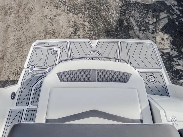 Slide: The Image of 2024 Monterey 258 SS boat deck with textured design and modern detailing. - 10