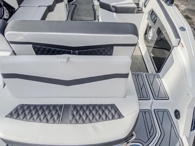 Slide: The Image of 2024 Monterey 258 SS boat interior with stylish seating and modern design. - 13