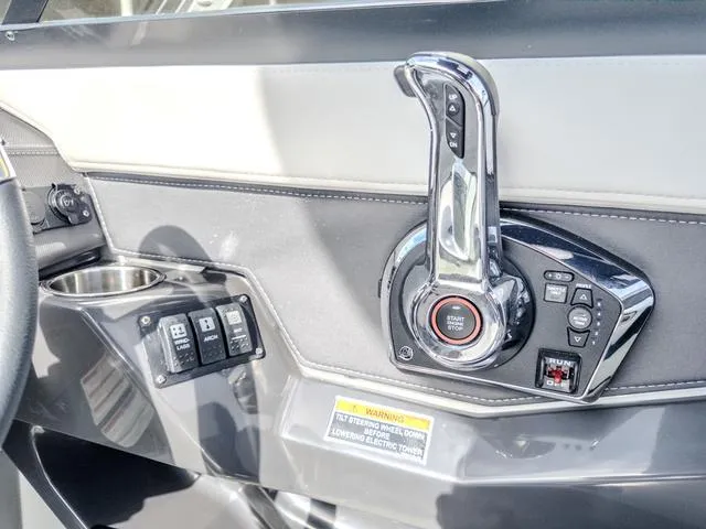 Slide: The Image of 2024 Monterey 258 SS boat control panel with throttle and start/stop button. - 24