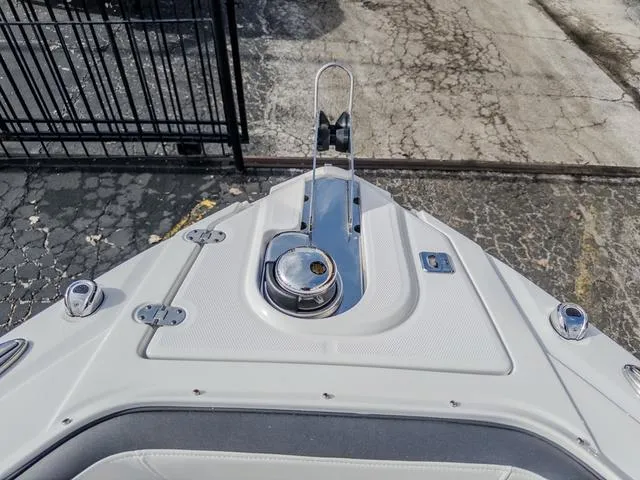 Slide: The Image of 2024 Monterey 258 SS boat bow with anchor and deck details. - 33