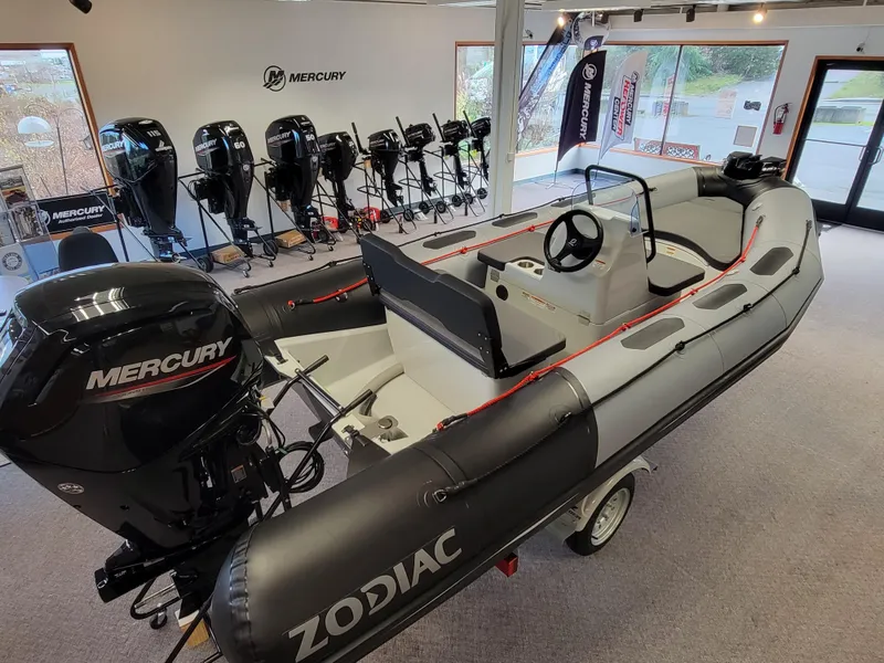 The Image of 2024 Zodiac Open 4.8 boat with Mercury engine in showroom. - 0