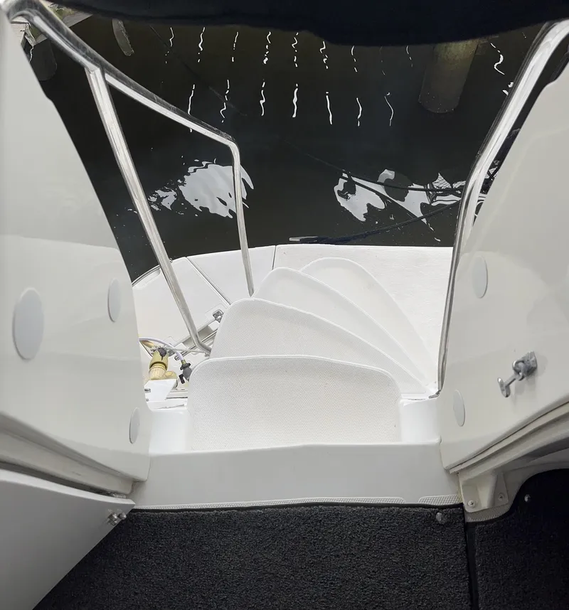 Slide: The Image of Staircase on 2002 Carver 466 Motor Yacht leading to water. - 19