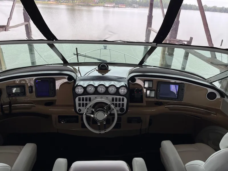 Slide: The Image of Helm of 2002 Carver 466 Motor Yacht with modern navigation instruments. - 31