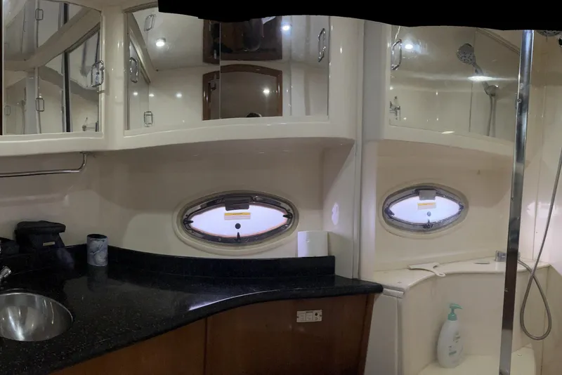 Slide: The Image of Luxurious bathroom in 2002 Carver 466 Motor Yacht with sleek design and modern fixtures. - 29