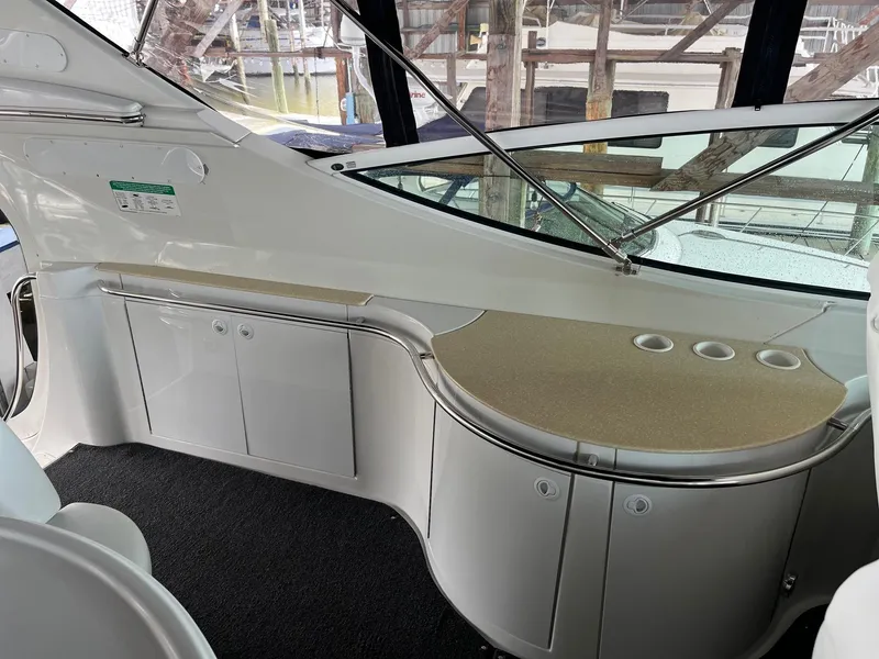 Slide: The Image of 2002 Carver 466 Motor Yacht interior with sleek cabinetry and countertop design. - 32