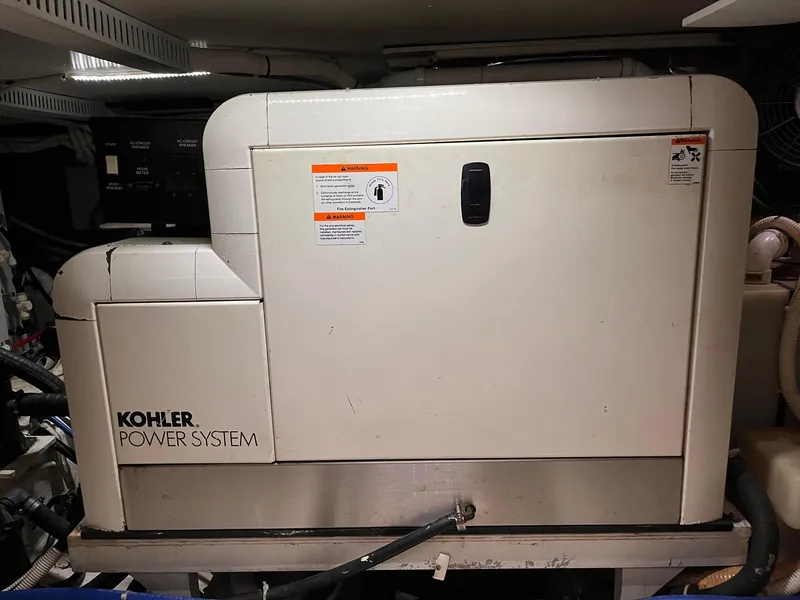 Slide: The Image of Kohler power system in 2002 Carver 466 Motor Yacht engine room. - 43