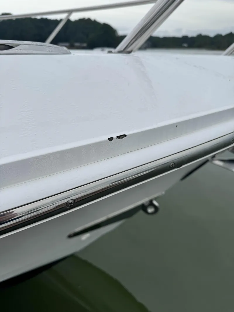 Slide: The Image of 2017 Boston Whaler 420 Outrage boat with minor hull damage. - 14