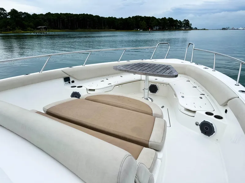 Slide: The Image of 2017 Boston Whaler 420 Outrage boat with spacious seating and scenic water view. - 20