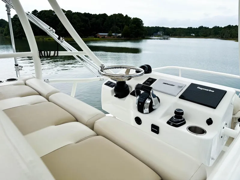 Slide: The Image of 2017 Boston Whaler 420 Outrage helm with scenic water view. - 40