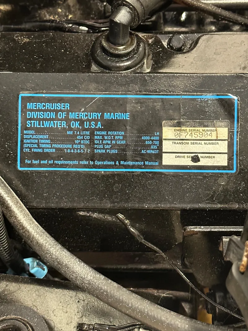 Slide: The Image of Mercruiser engine label on 1974 Donzi Center Console boat, showing specifications and serial number. - 8