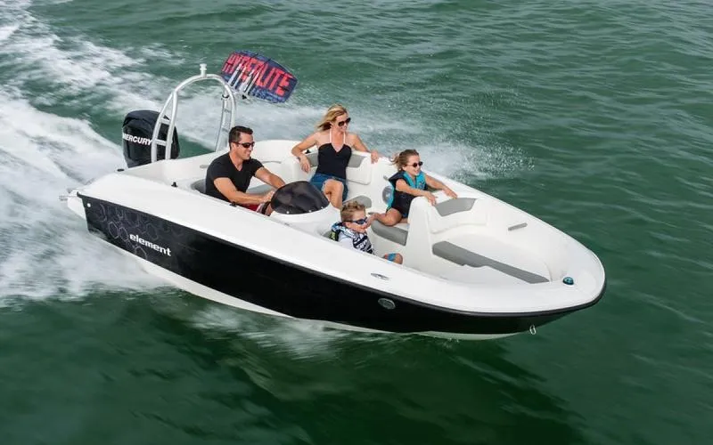 Slide: The Image of 2020 Bayliner Element E16 boat cruising with family on the water. - 9
