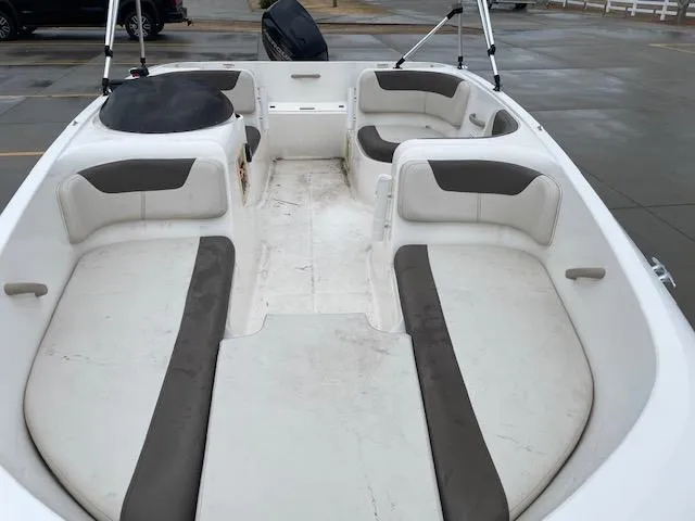 Slide: The Image of 2020 Bayliner Element E16 boat interior with spacious seating and clean design. - 7