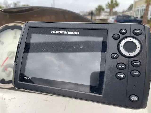 Slide: The Image of Humminbird Helix 5 fish finder on 2020 Bayliner Element E16 boat dashboard. - 5