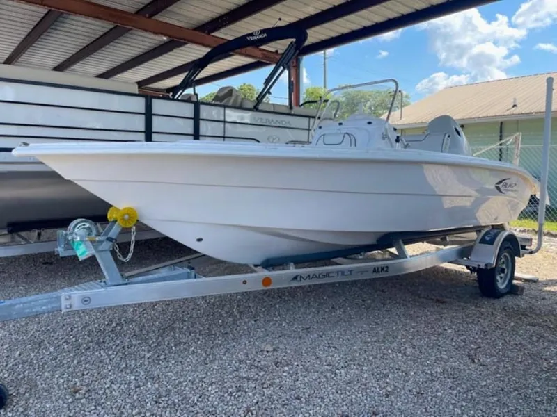 Slide: The Image of 2024 ALK2 Powerboats 18 CRS on trailer under shelter, side view. - 2