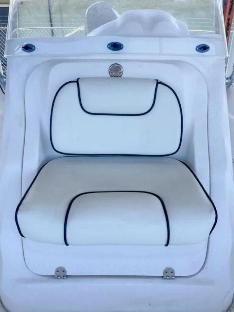 Slide: The Image of 2024 ALK2 Powerboats 18 CRS white cushioned seat with black trim. - 5