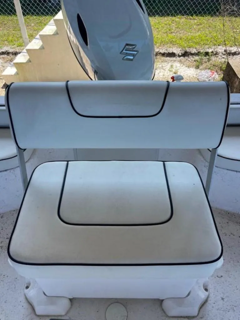 Slide: The Image of 2024 ALK2 Powerboats 18 CRS seat with white upholstery and black trim. - 7
