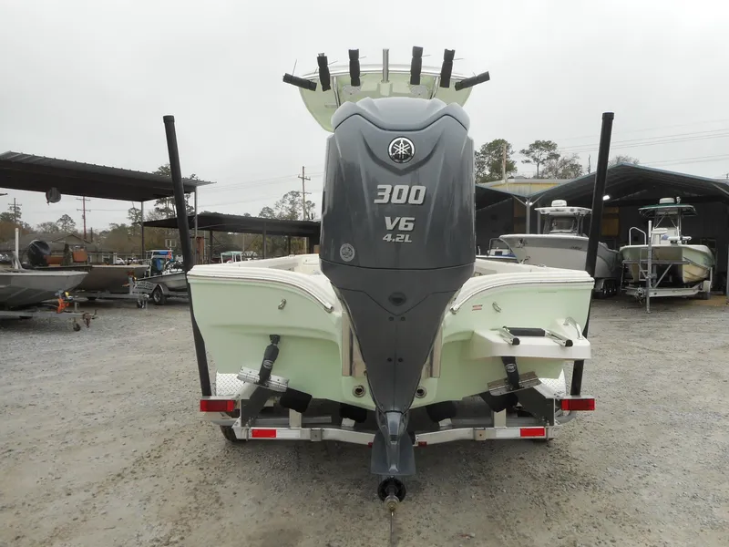 Slide: The Image of 2024 Avenger 26 boat with Yamaha 300 V6 engine, rear view. - 3