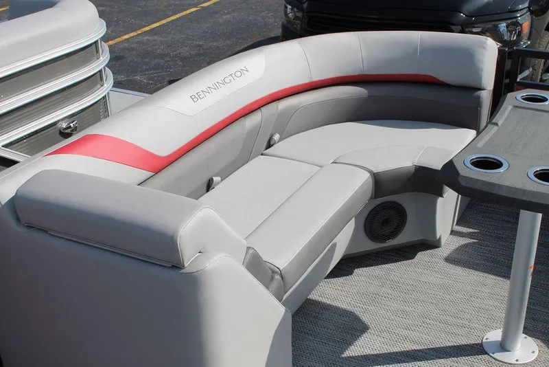 Slide: The Image of 2024 Bennington 23 SXSR pontoon boat with gray and red seating. - 12