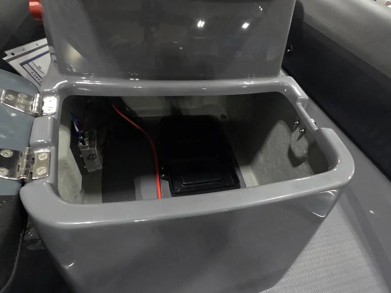Slide: The Image of Open storage compartment of 2024 Grand Inflatables S370NL boat. - 13