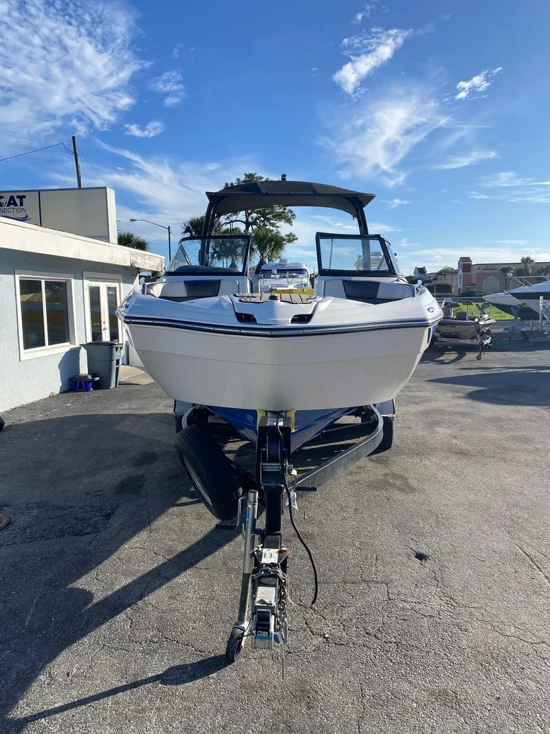 Slide: The Image of 2018 Yamaha Boats AR240 HO on trailer, front view, sunny day. - 1