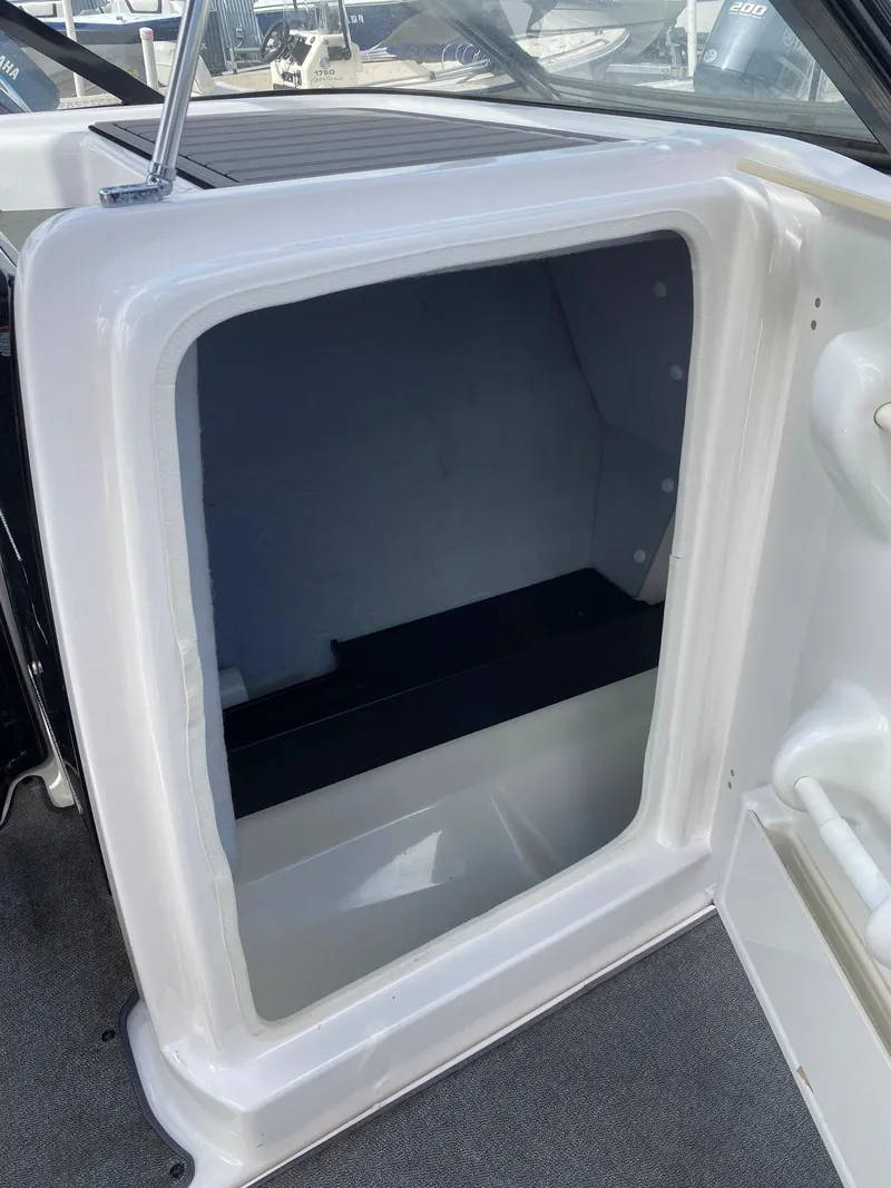 Slide: The Image of 2018 Yamaha Boats AR240 HO storage compartment. - 21
