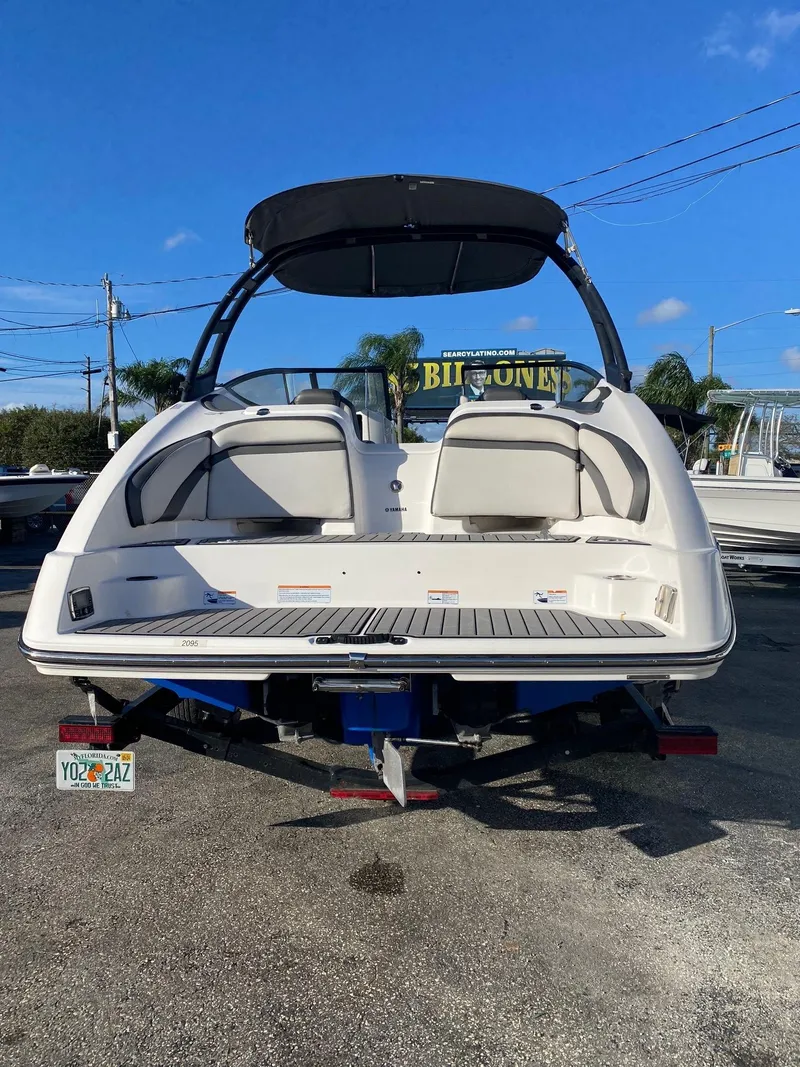 Slide: The Image of 2018 Yamaha Boats AR240 HO with swim platform and bimini top. - 3