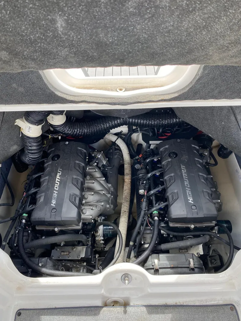 Slide: The Image of 2018 Yamaha Boats AR240 HO engine compartment with twin high output engines. - 34