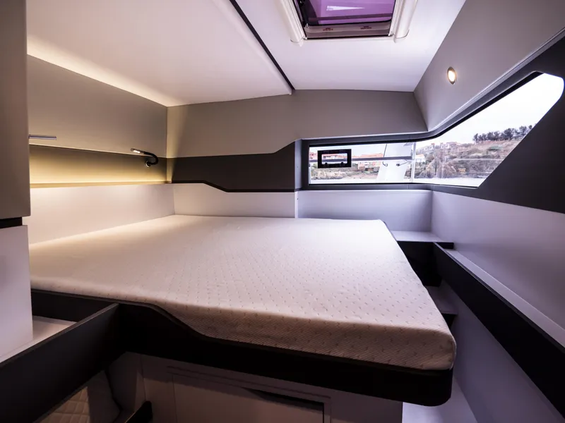 Slide: The Image of Modern bedroom interior of 2025 Windelo 50 Adventure yacht with large bed and window. - 38