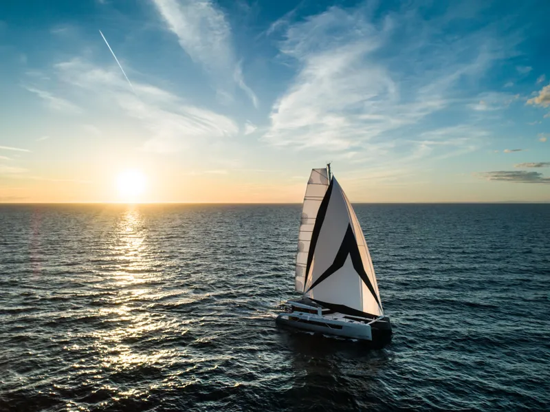 Slide: The Image of Windelo 54 sailboat cruising at sunset on the open sea, 2025 model. - 27