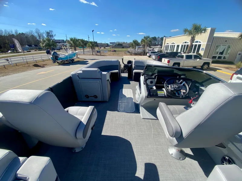 Slide: The Image of 2023 Vanderbilt 700T boat interior with seating and steering console. - 13