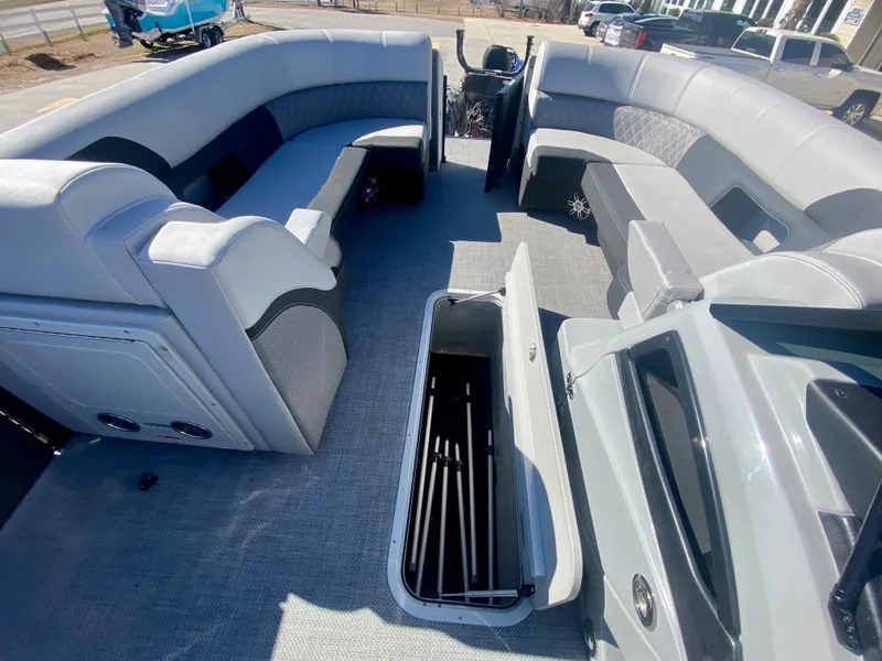 Slide: The Image of 2023 Vanderbilt 700T boat interior with spacious seating and storage compartments. - 21