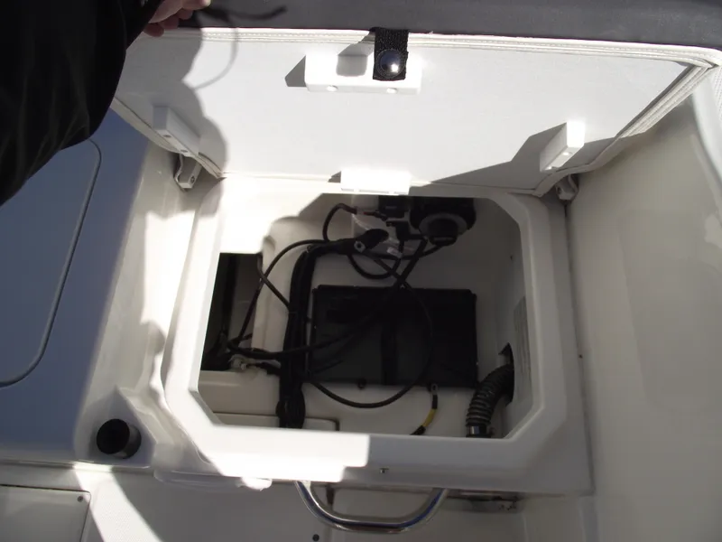 Slide: The Image of 2024 Bayliner CC20 boat rod holders and console detail. - 14