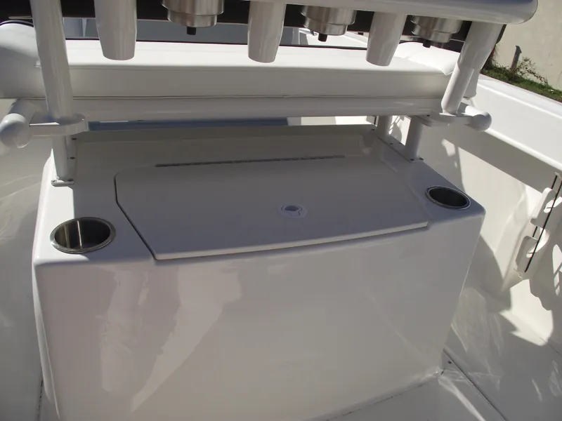 Slide: The Image of 2024 Bayliner CC20 boat console with steering wheel and control panel. - 17