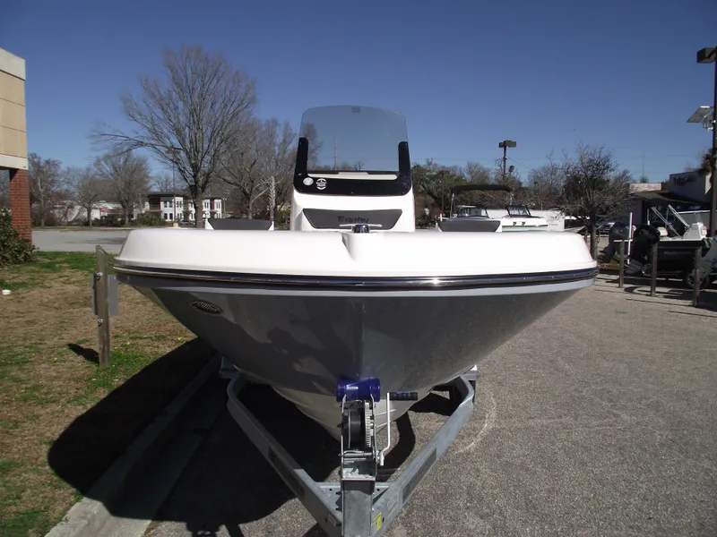 Slide: The Image of 2024 Bayliner CC20 boat with a Mercury outboard motor. - 3