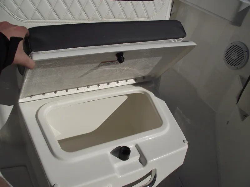 Slide: The Image of 2024 Bayliner CC20 boat storage compartment with open lid. - 30