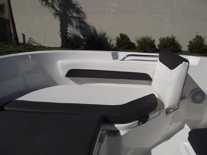 Slide: The Image of 2024 Bayliner CC20 boat bow seating area with cushions. - 33