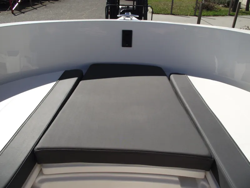 Slide: The Image of 2024 Bayliner CC20 boat interior with white and black seating. - 35