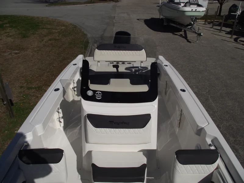 Slide: The Image of 2024 Bayliner CC20 boat on a trailer, side view. - 38