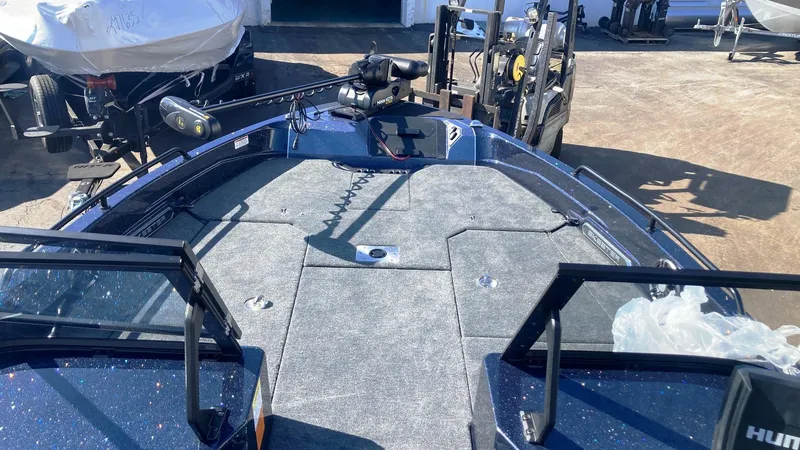 Slide: The Image of 2024 Skeeter WXR 2060 F fishing boat deck with mounted equipment. - 3