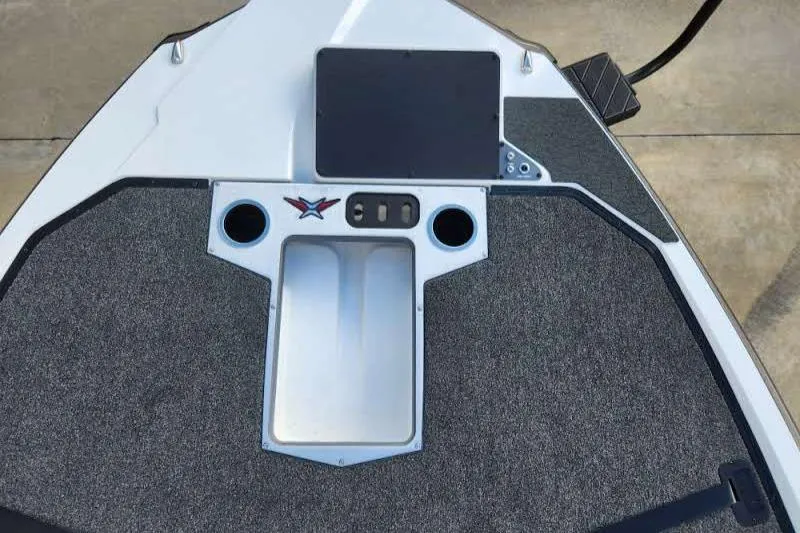 Slide: The Image of 2024 Vexus VXS20 boat deck with storage compartments and control panel. - 3