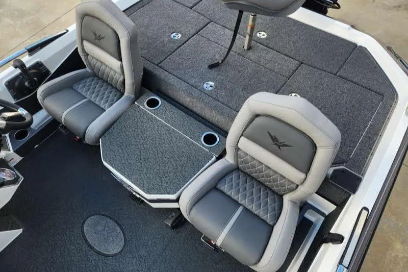 Slide: The Image of 2024 Vexus VXS20 boat interior with two cushioned seats and storage compartments. - 6