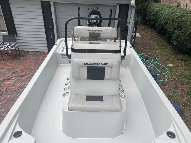 Slide: The Image of 2020 Blazer 2200 Fisherman boat with center console and seating. - 6