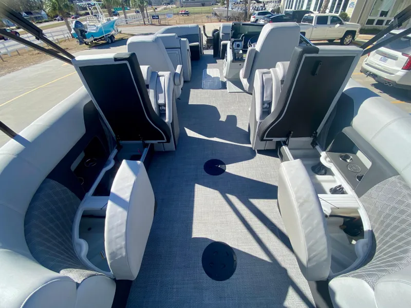Slide: The Image of Interior of a 2023 Vanderbilt 700T boat with open storage compartments. - 12